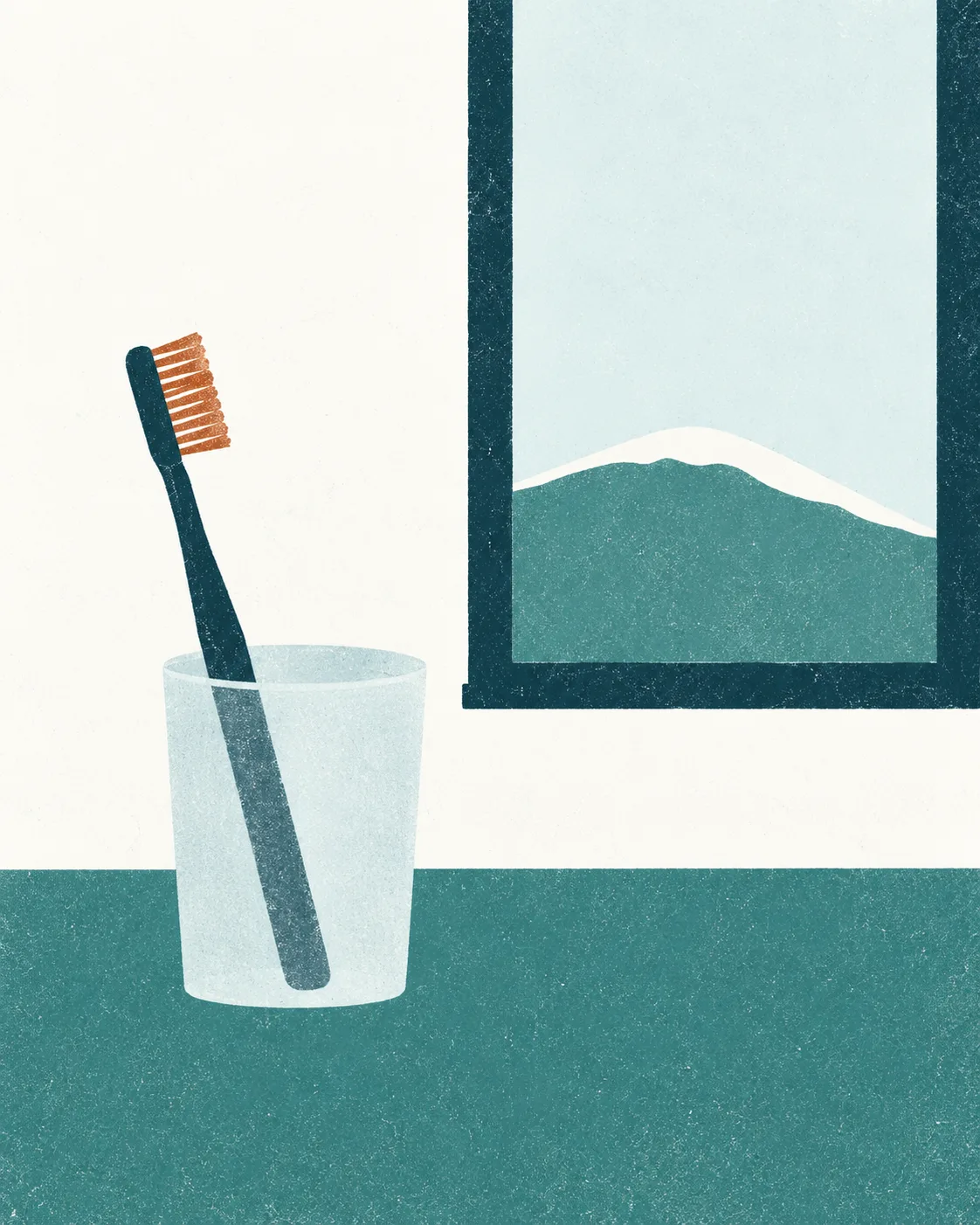 Cepillo de dientes en un vaso junto a una ventana con un cerro nevado de Coyhaique